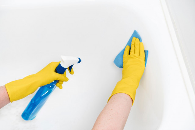 How do you remove mold from silicone sealant in a bathroom?